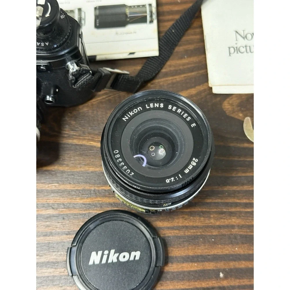 Vintage Nikon EM Camera Bundle W/lenses Bag Advertisement Receipts 50 mm 28 mm